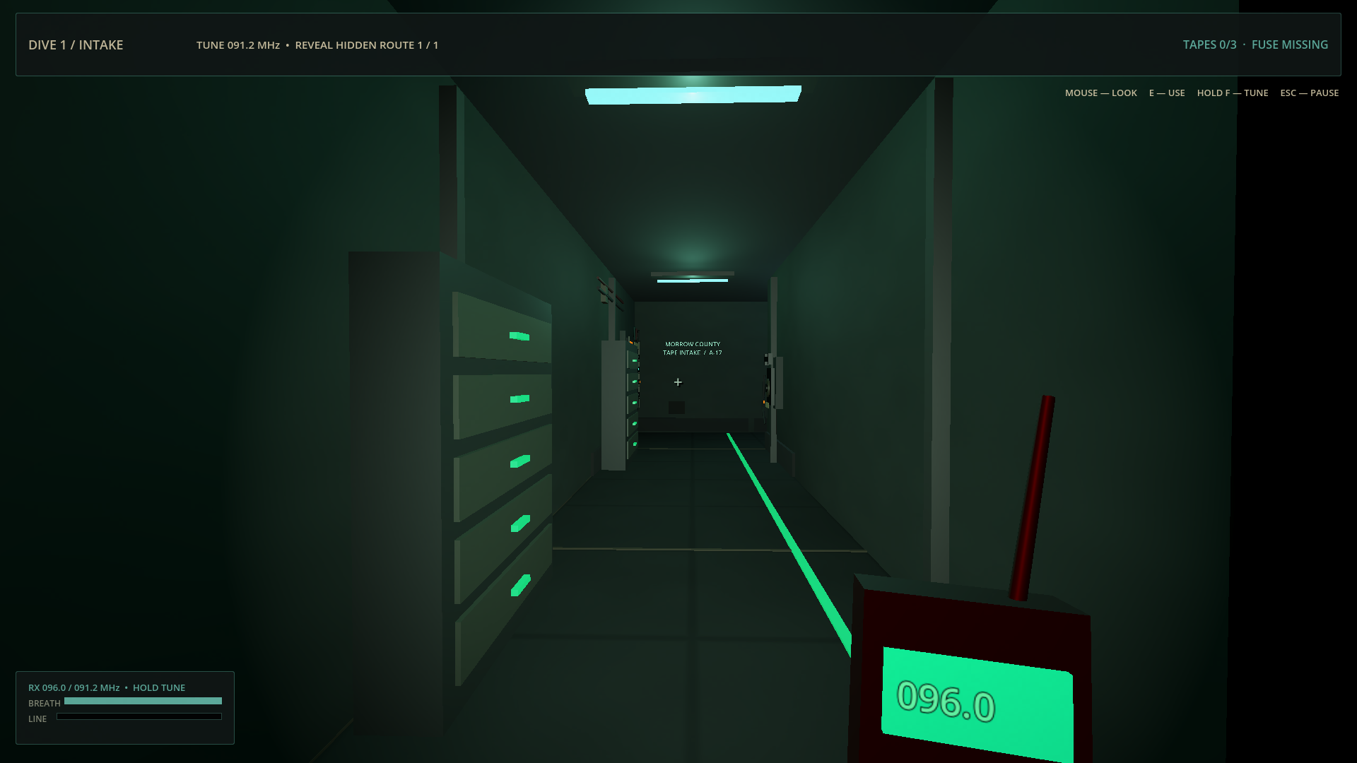 A dark corridor inside the tape intake beneath the Municipal Archive.