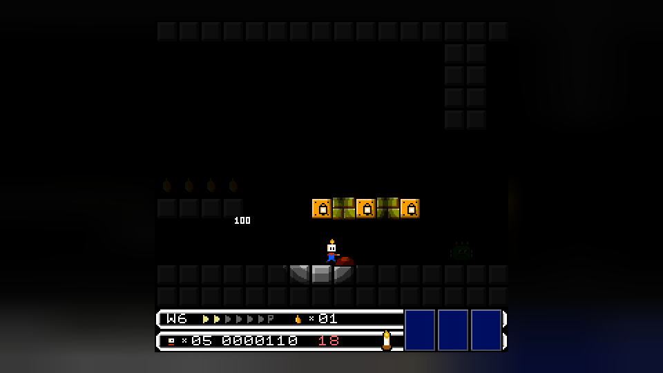 A level almost entirely in darkness, with a small circle of light around the player's candle.